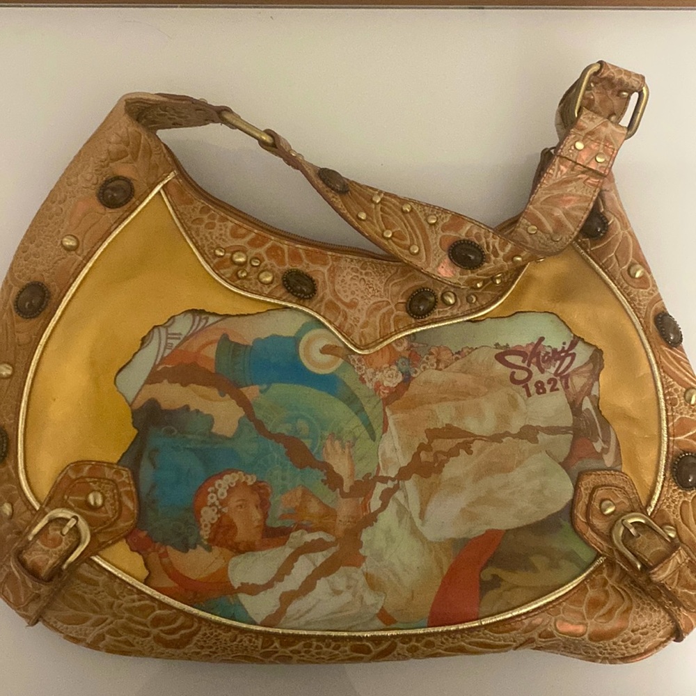 Sharif couture leather handbag with exquisite detailing